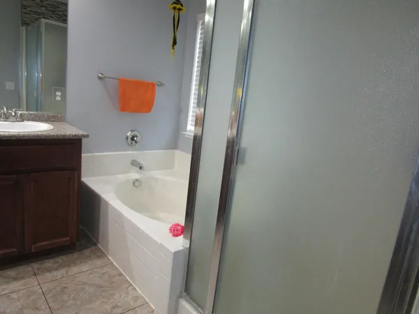 a bathroom with a sink and a bathtub