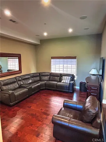 a living room with furniture and a couch