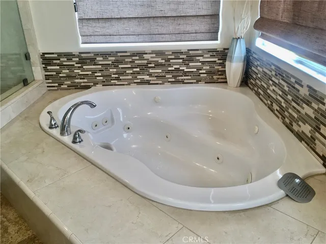 a bathroom with a bathtub