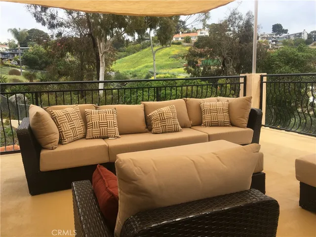 a view of a couches in a balcony