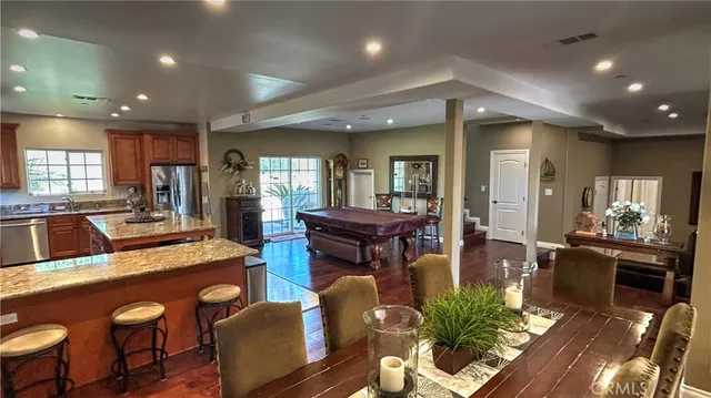 a large kitchen with lots of counter space and windows