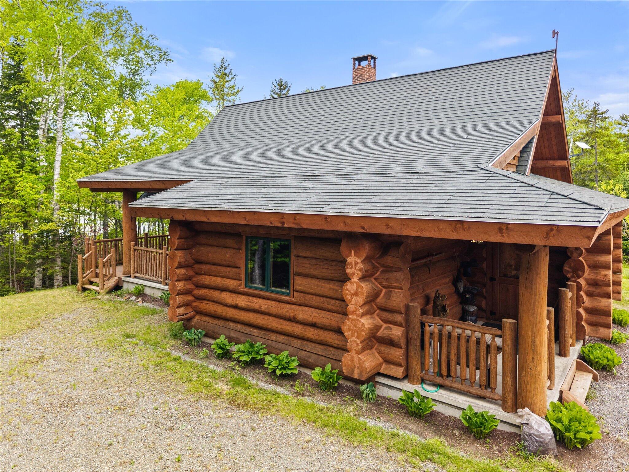 314 Atwood Pond Road Patten, ME 04765 - Photo 13 of 76 Hand notched logs...