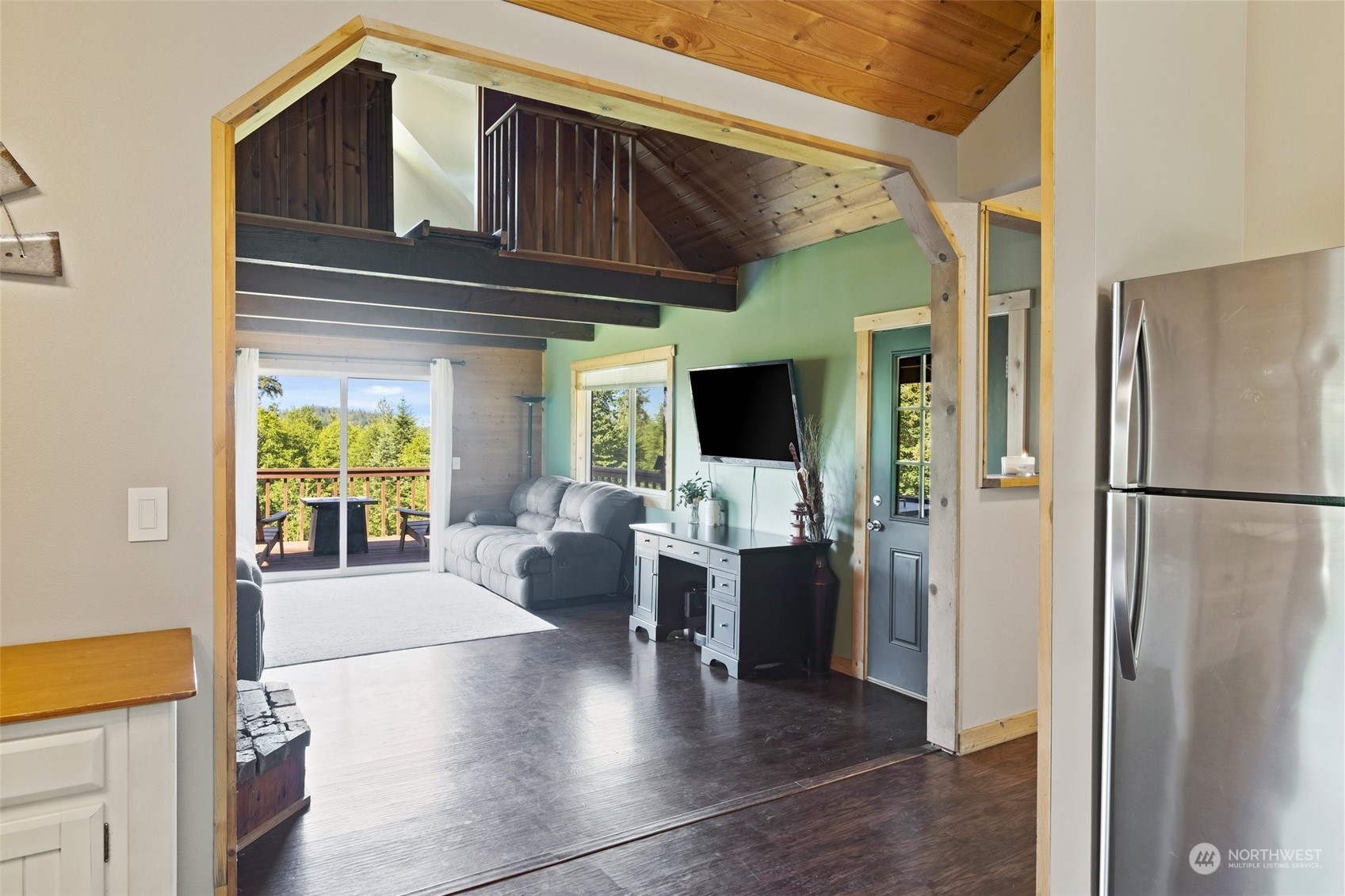 239 View Ridge Road Onalaska, WA 98570 - Photo 14 of 33 a view of a living room with a large window