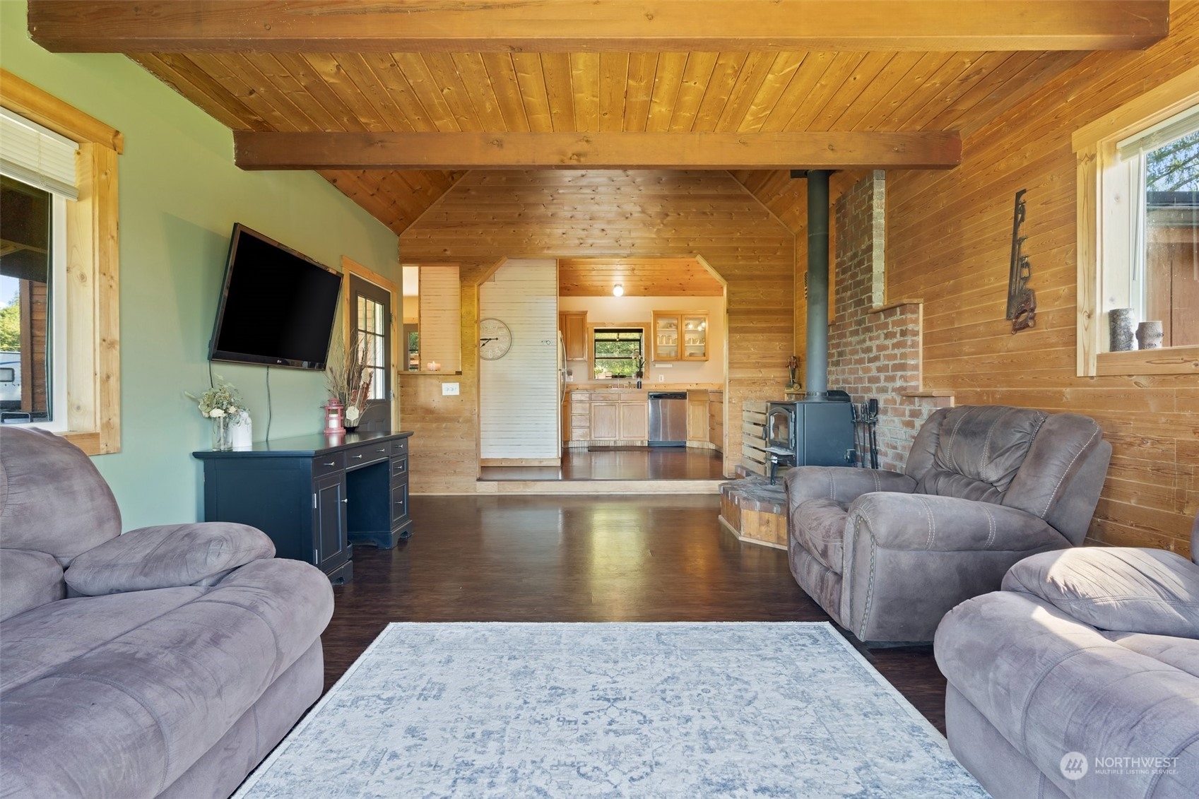 239 View Ridge Road Onalaska, WA 98570 - Photo 16 of 33 a living room with furniture and a flat screen tv