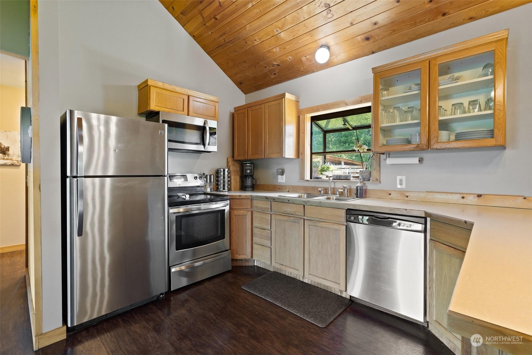 239 View Ridge Road Onalaska, WA 98570 - Photo 17 of 33 a kitchen with stainless steel appliances granite countertop a refrigerator and a sink