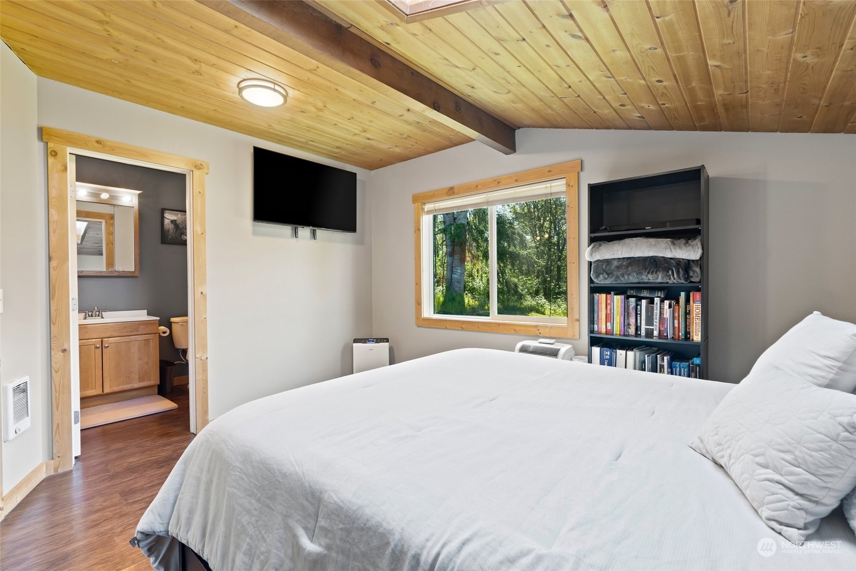 239 View Ridge Road Onalaska, WA 98570 - Photo 21 of 33 a bedroom with a large bed and a window