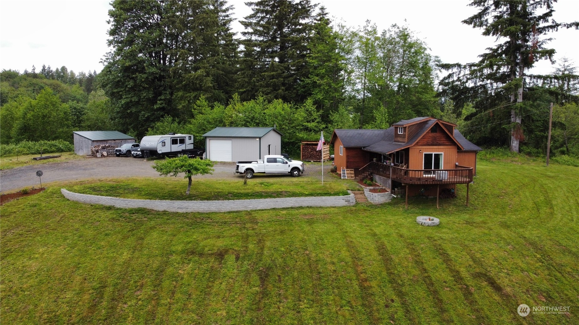 239 View Ridge Road Onalaska, WA 98570 - Photo 28 of 33 a view of a house with backyard porch and sitting area