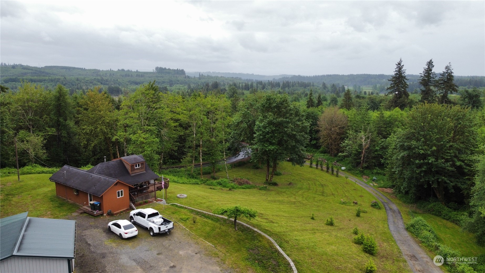 239 View Ridge Road Onalaska, WA 98570 - Photo 29 of 33 a view of a golf course with a garden