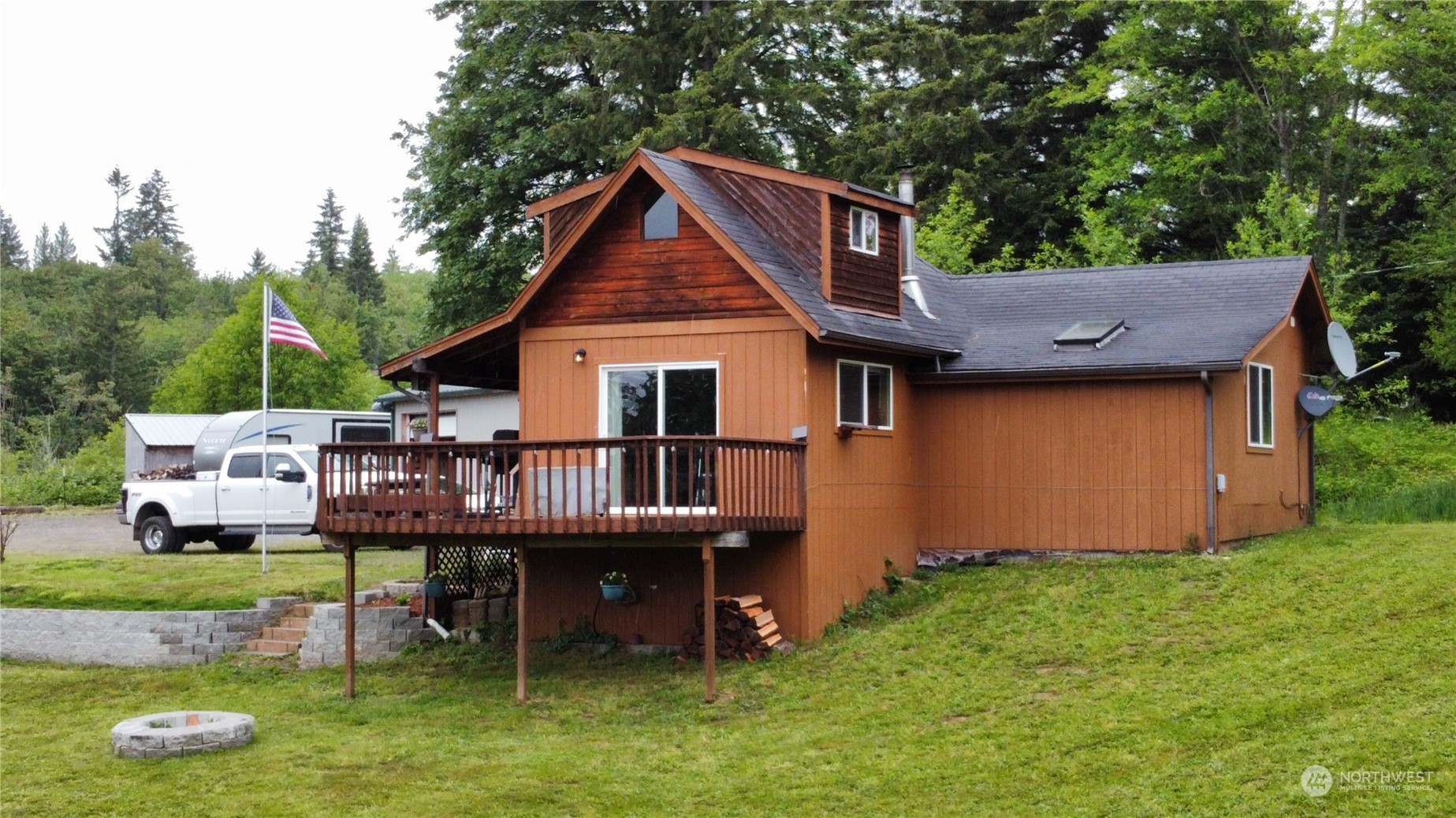 239 View Ridge Road Onalaska, WA 98570 - Photo 3 of 33 a aerial view of a house with a yard table and chairs