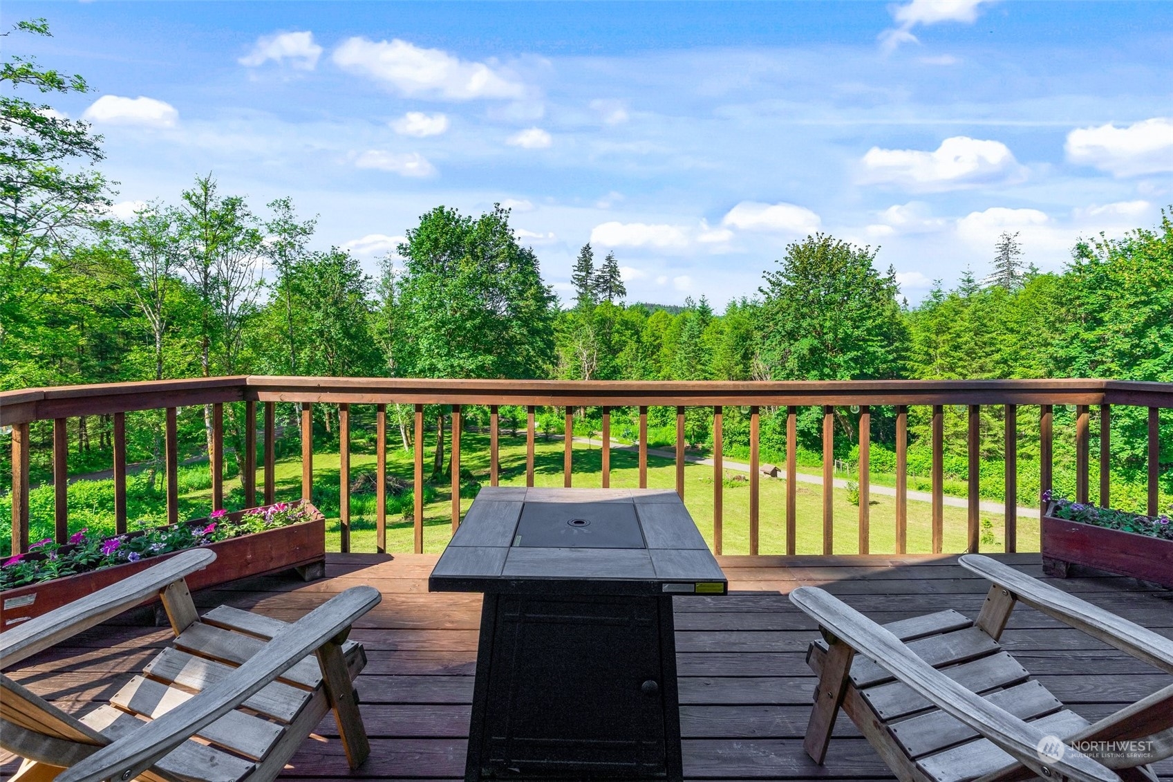 239 View Ridge Road Onalaska, WA 98570 - Photo 5 of 33 a view of a balcony with wooden floor and outdoor space