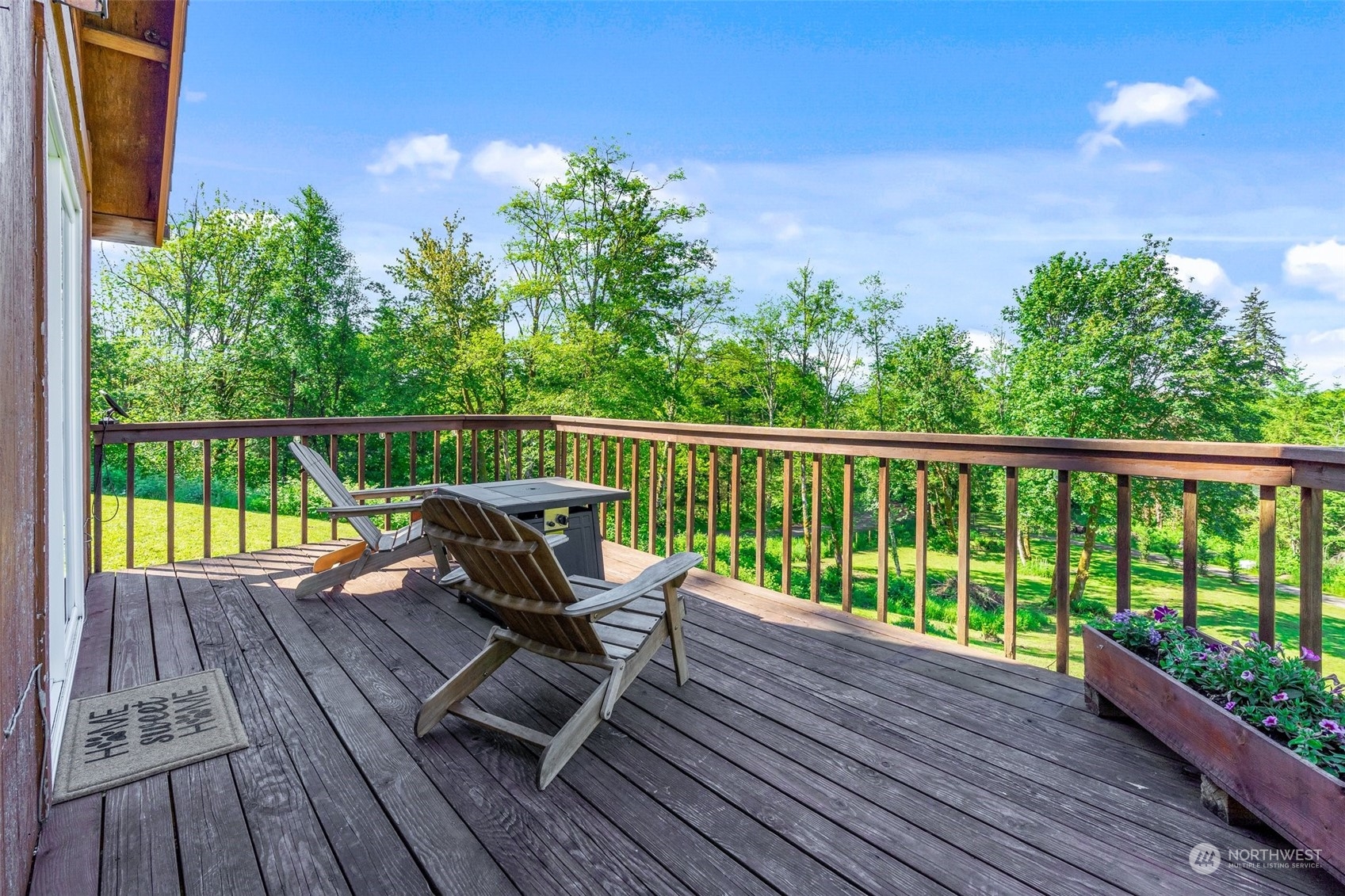 239 View Ridge Road Onalaska, WA 98570 - Photo 7 of 33 a view of a wooden deck with a bench