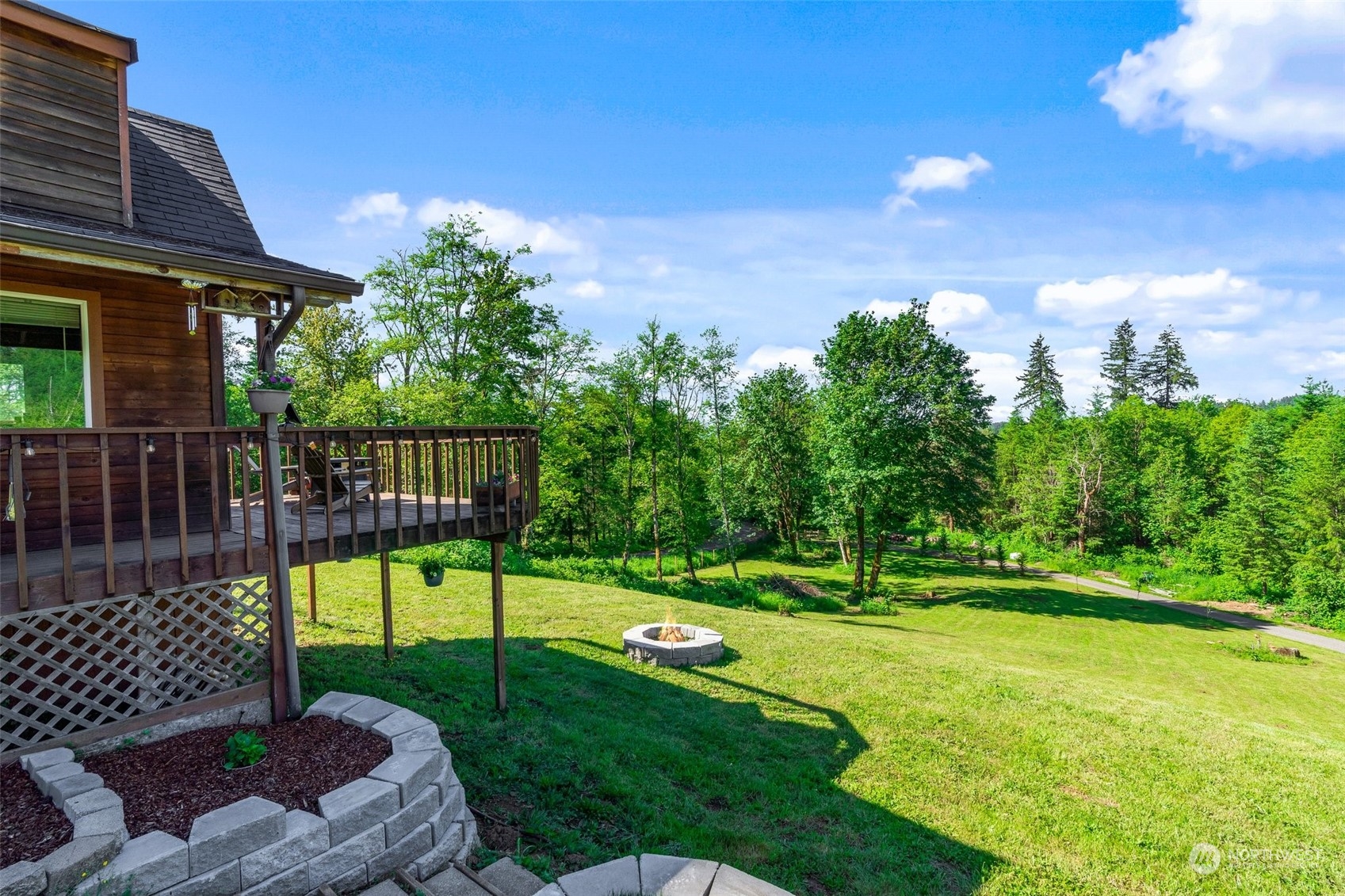 239 View Ridge Road Onalaska, WA 98570 - Photo 10 of 33 a view of a garden with a patio