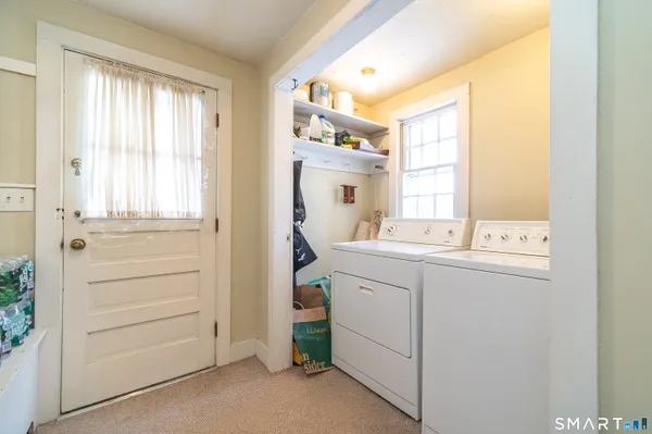 a room with dryer and washer