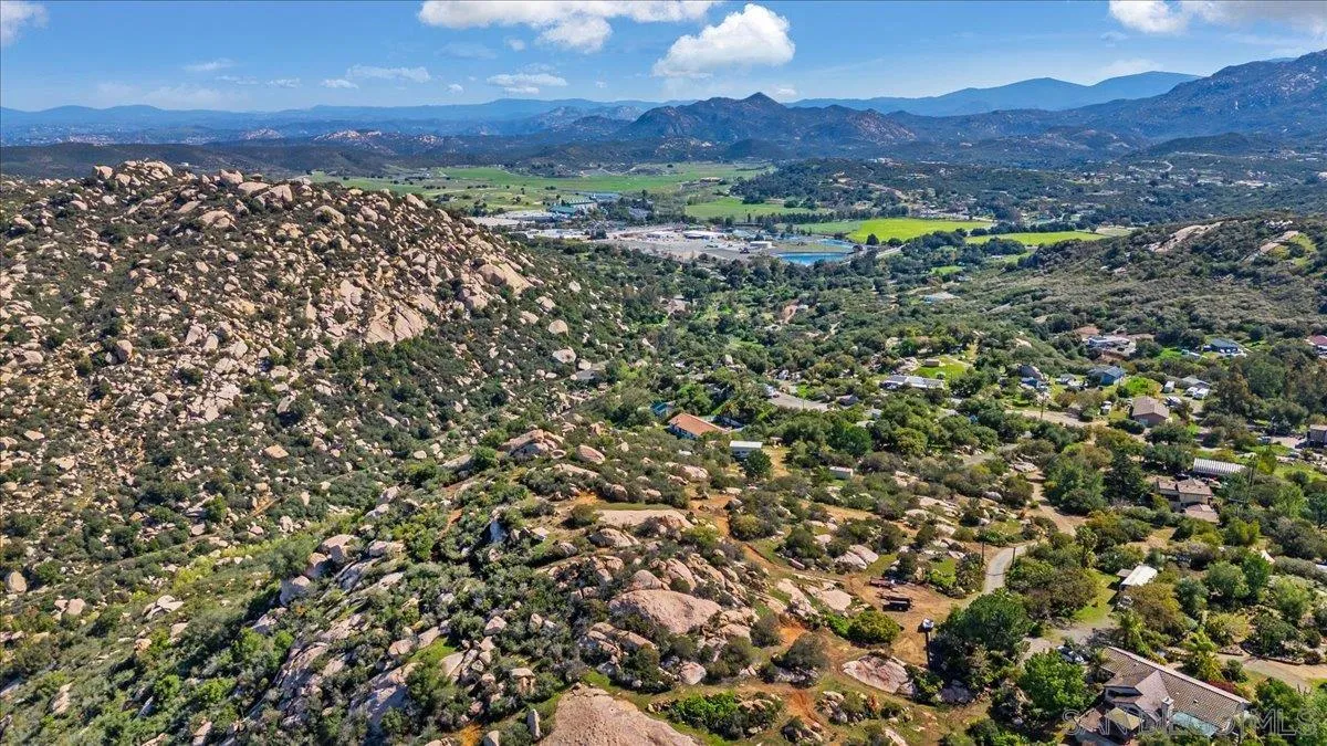 0 Barona Road, Unit 82082 Lakeside, CA 92040 - Photo 12 of 26 a view of a lush green field with lots of bushes