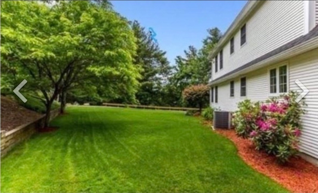84 South Street, Unit R Northborough, MA 01532 - Photo 1 of 7 a view of a house with a back yard