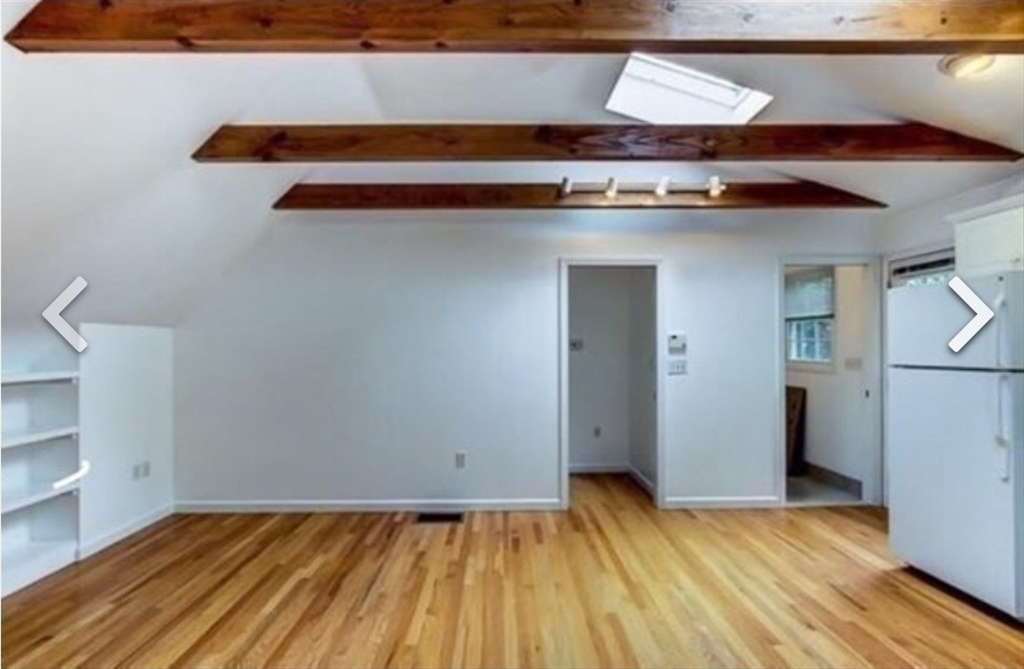 84 South Street, Unit R Northborough, MA 01532 - Photo 4 of 7 a view of a room with wooden floor and cabinets