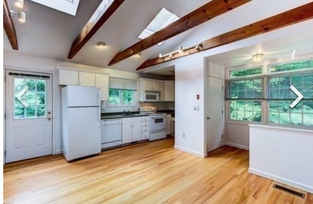 84 South Street, Unit R Northborough, MA 01532 - Photo 6 of 7 a kitchen with stainless steel appliances a refrigerator and a stove
