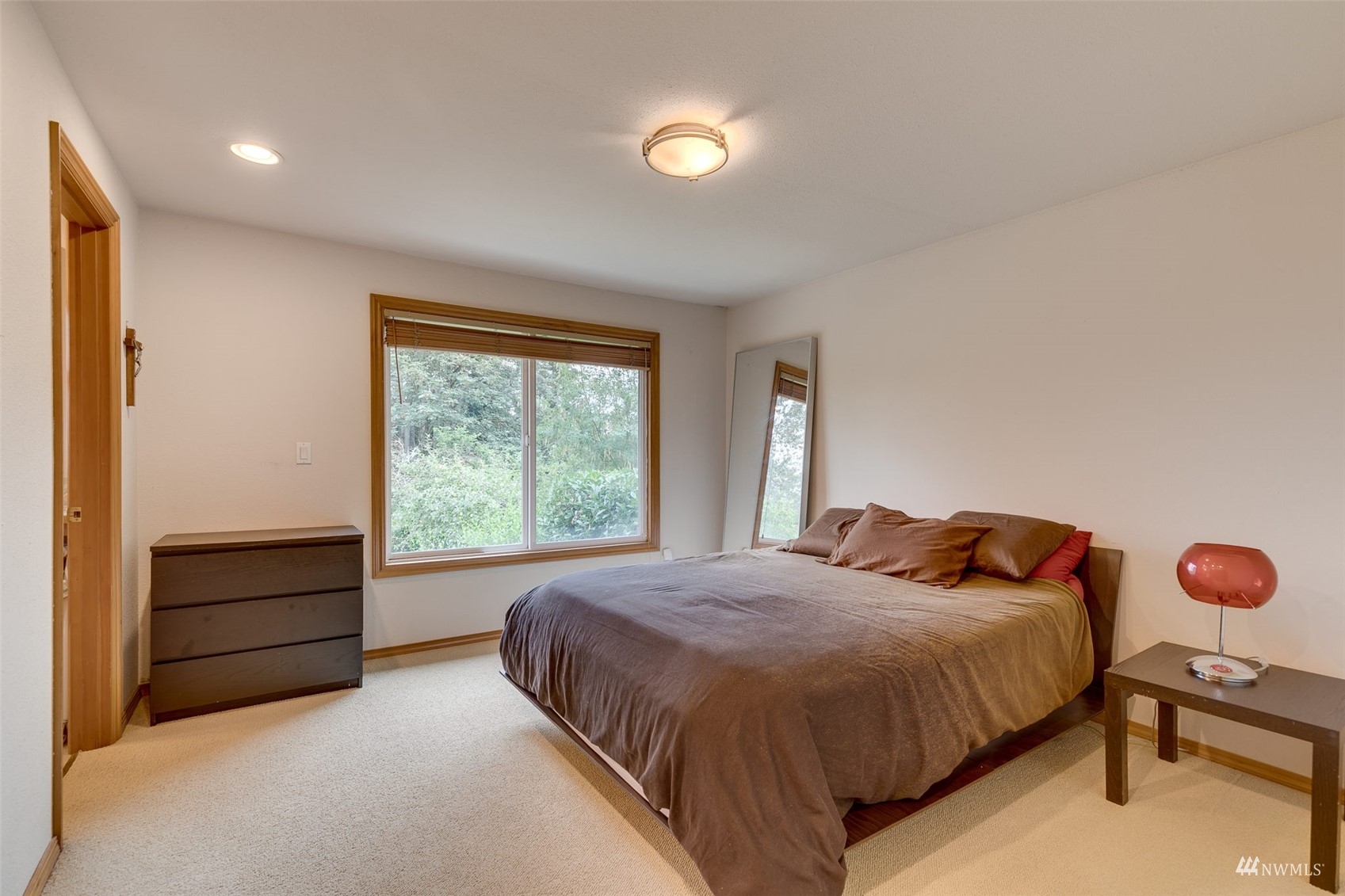 22417 4th Avenue Southeast Bothell, WA 98021 - Photo 11 of 27 a bedroom with a bed and a window