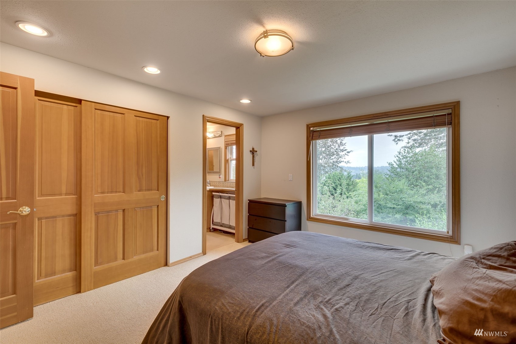 22417 4th Avenue Southeast Bothell, WA 98021 - Photo 12 of 27 a bedroom with a bed and a window