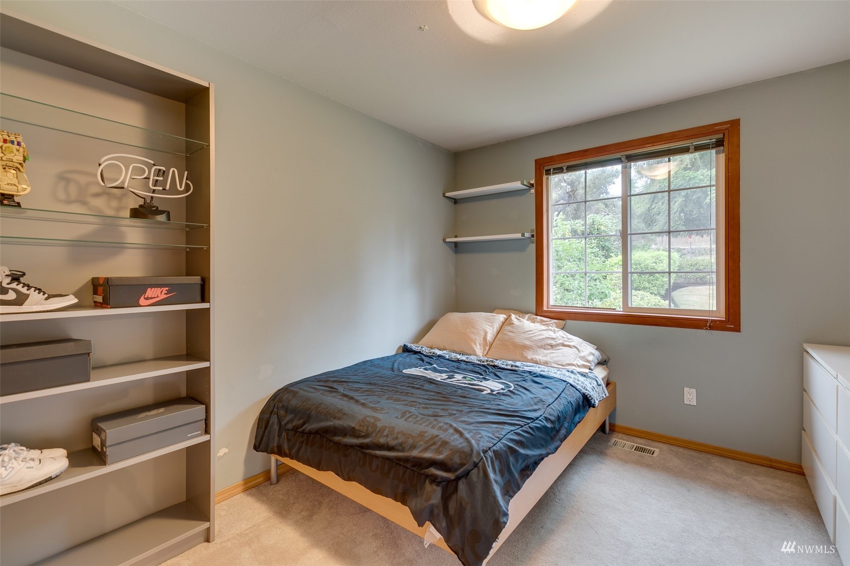 22417 4th Avenue Southeast Bothell, WA 98021 - Photo 15 of 27 a bedroom with a bed and a window