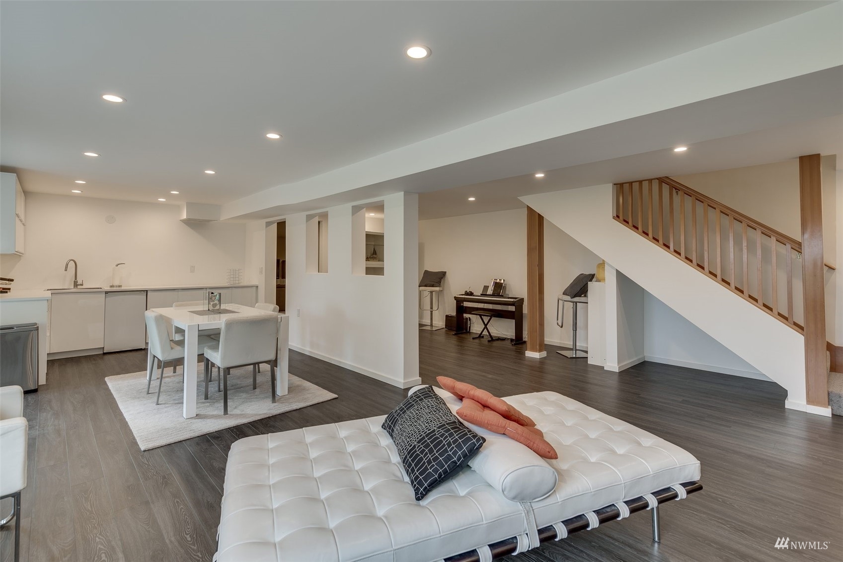 22417 4th Avenue Southeast Bothell, WA 98021 - Photo 16 of 27 a living room with furniture and kitchen view with wooden floor