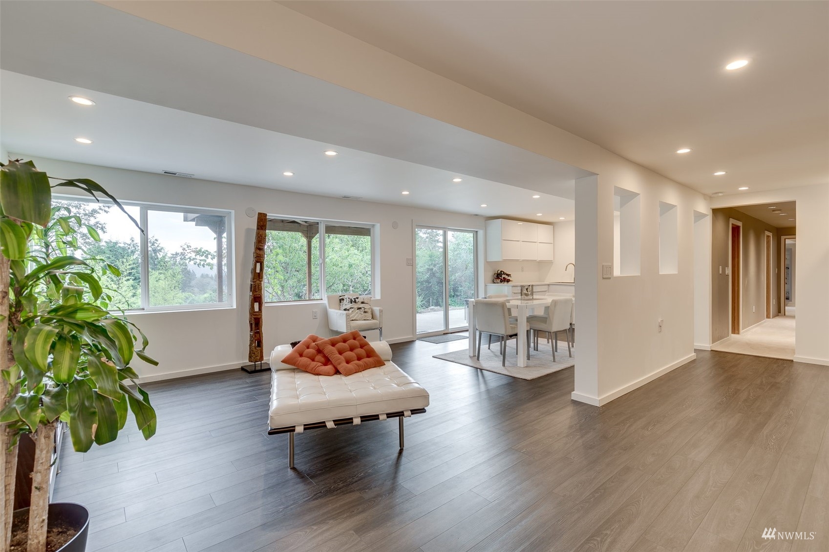 22417 4th Avenue Southeast Bothell, WA 98021 - Photo 17 of 27 a living room with furniture and a potted plant