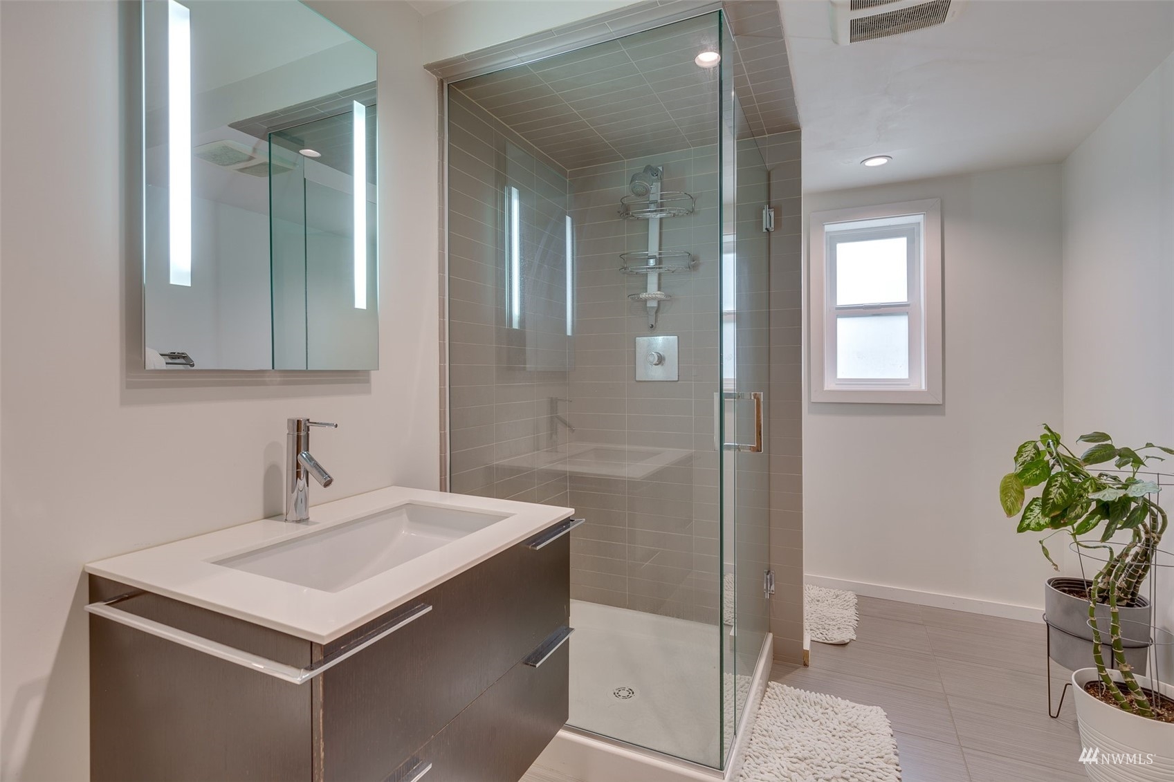 22417 4th Avenue Southeast Bothell, WA 98021 - Photo 20 of 27 a bathroom with a sink and a mirror