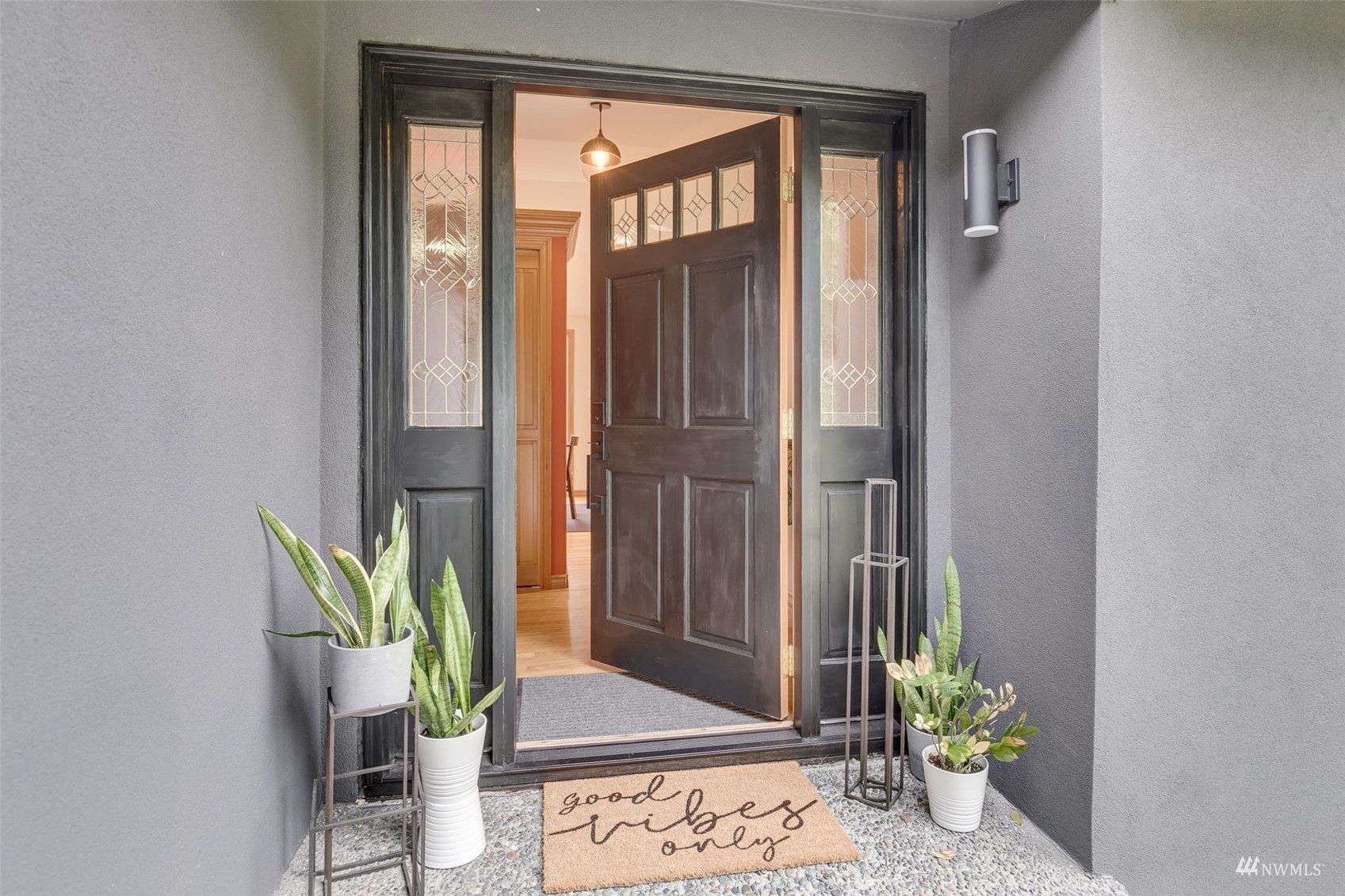 22417 4th Avenue Southeast Bothell, WA 98021 - Photo 3 of 27 a view of a hallway with furniture and a potted plant