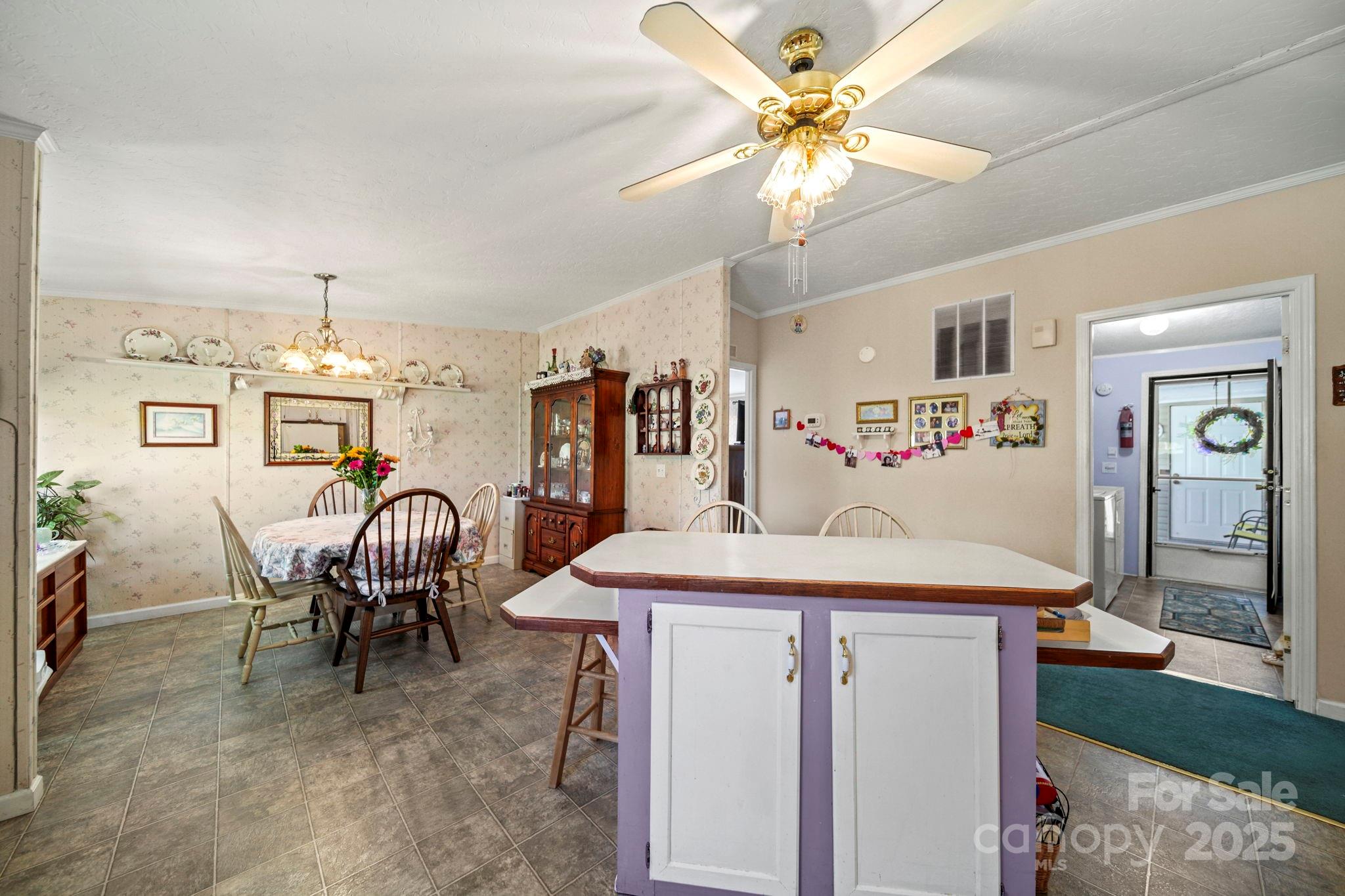 2107 Gheen Road Salisbury, NC 28147 - Photo 11 of 32 a view of a dining room with furniture window and wooden floor