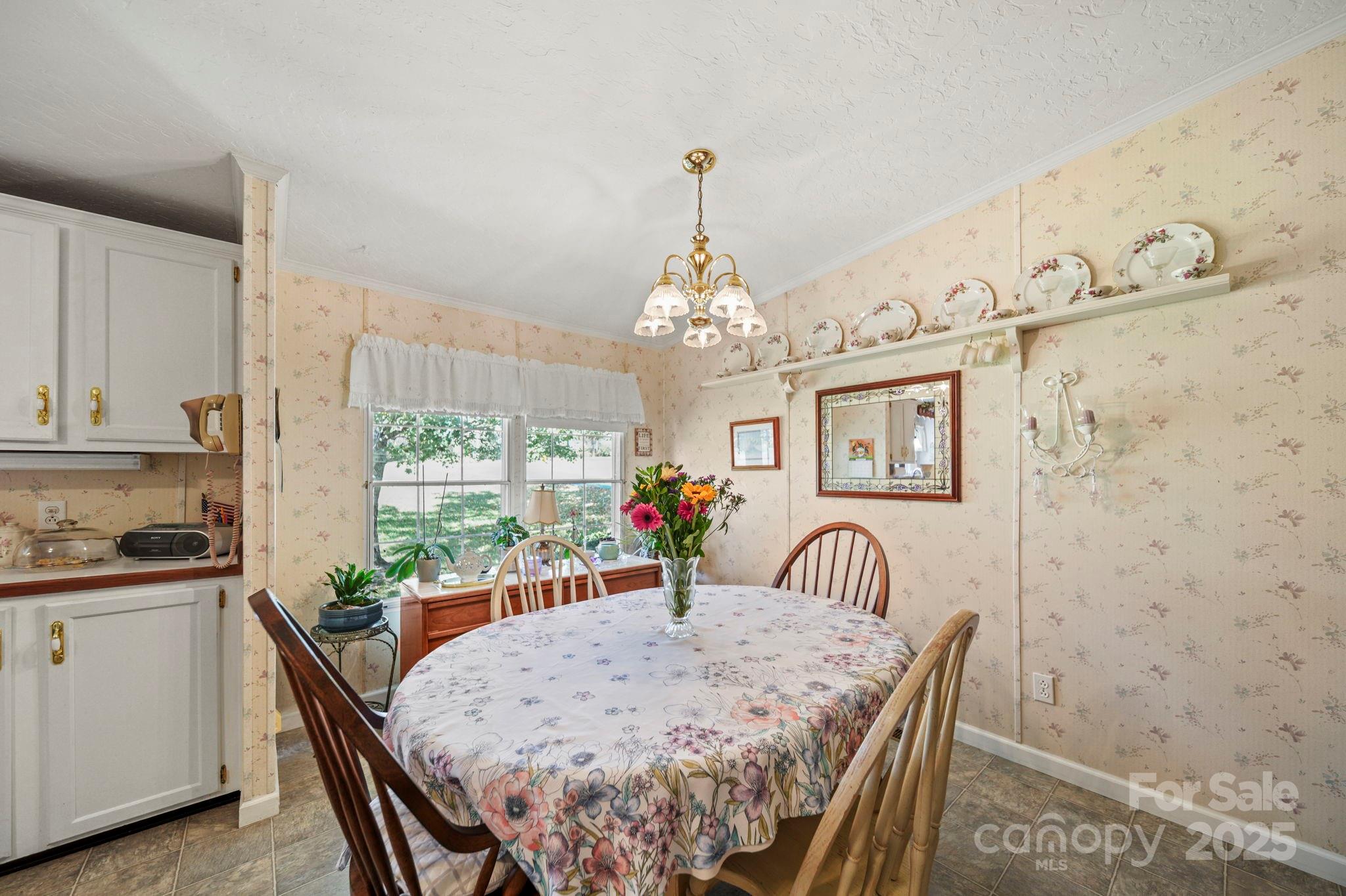 2107 Gheen Road Salisbury, NC 28147 - Photo 13 of 32 a view of a dining room with furniture window and outside view