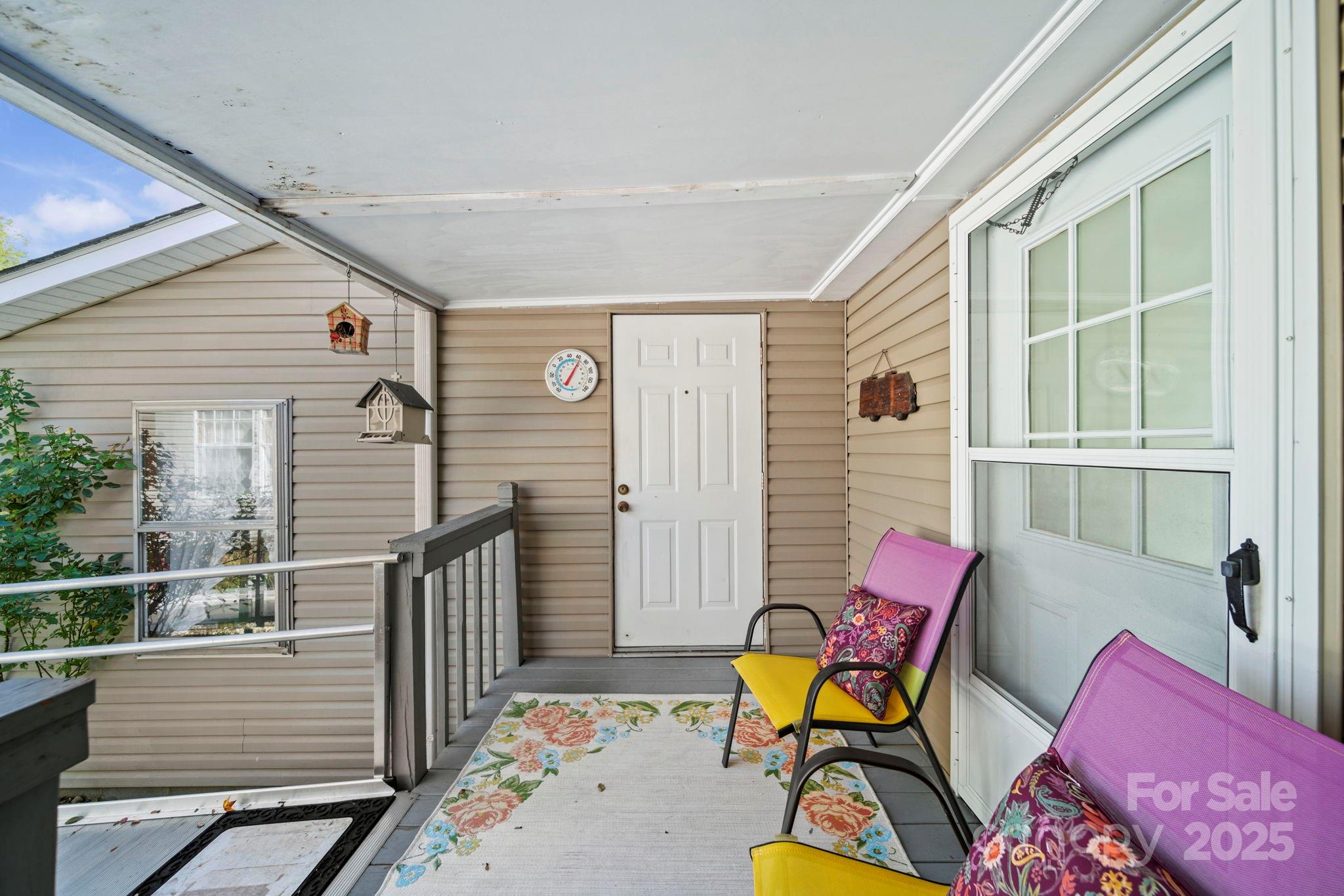 2107 Gheen Road Salisbury, NC 28147 - Photo 26 of 32 a balcony with furniture and wooden floor