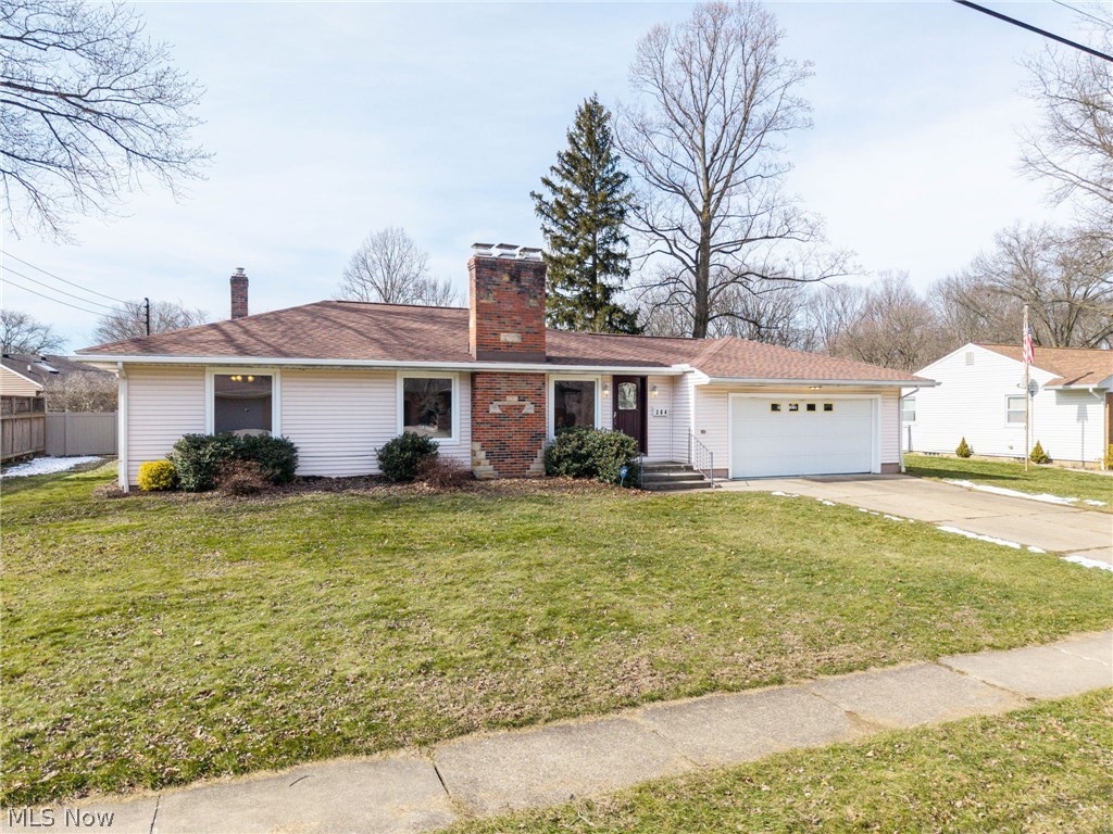 364 Mowbray Road Akron, OH 44333 - Photo 1 of 44 Ranch-style house with a chimney, a garage, driveway, and a front yard