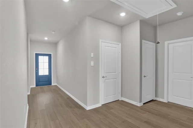 a view of a livingroom with wooden floor