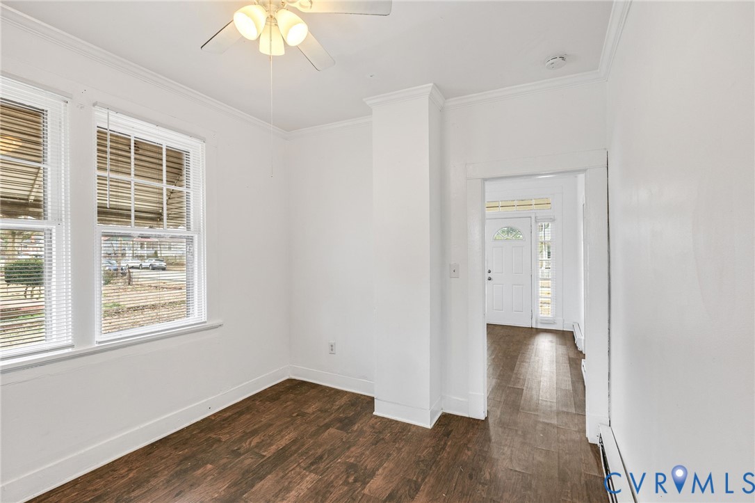 3414 Decatur Street Richmond, VA 23224 - Photo 7 of 16 Spare room with ornamental molding, dark wood-styl