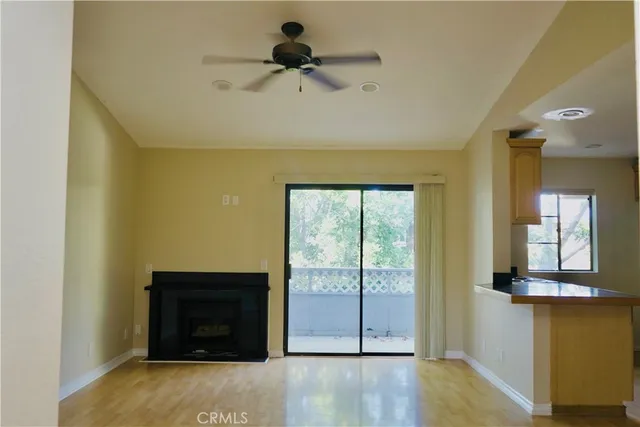 a room with a stove and a window