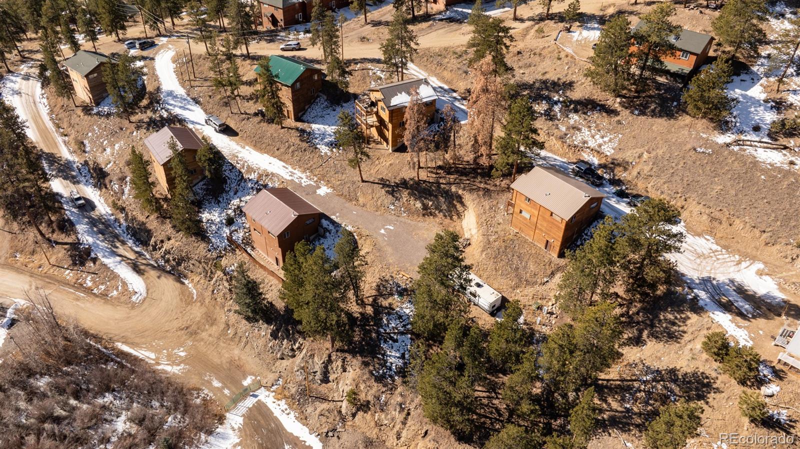 a view of residential houses with outdoor space