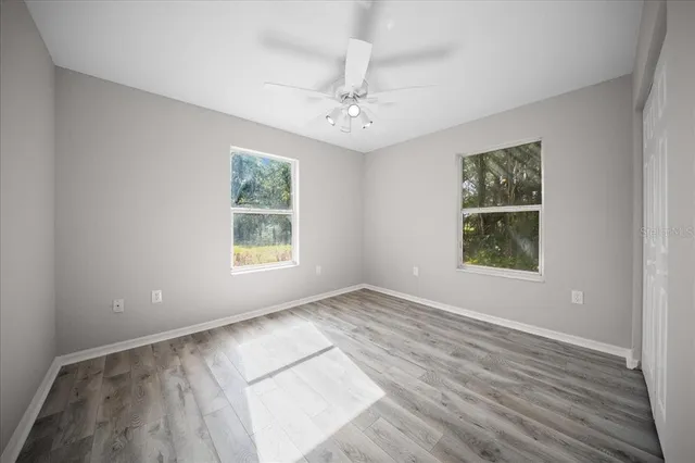 a view of living room with furniture and flat screen tv