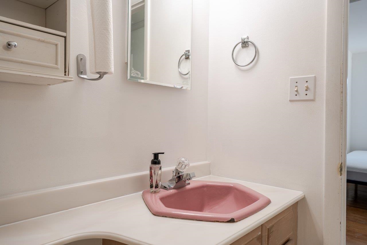 11918 Turleytown Road Broadway, VA 22815 - Photo 28 of 42 a bathroom with a sink and a mirror