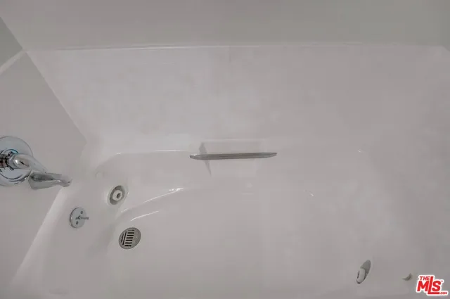 a bathroom with a sink and toilet