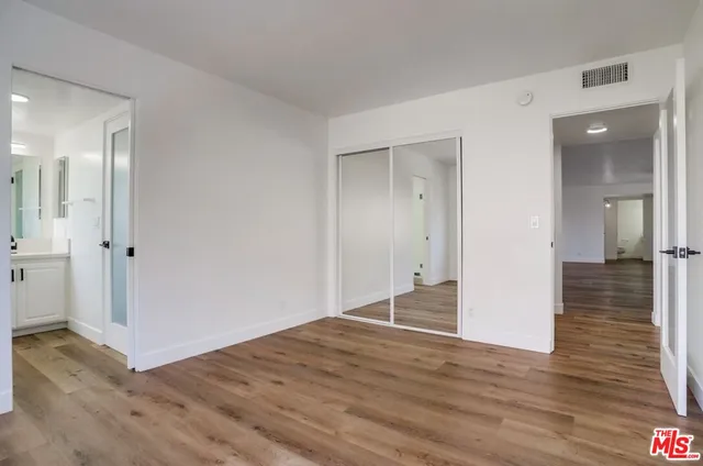 a swimming pool with outdoor seating and yard