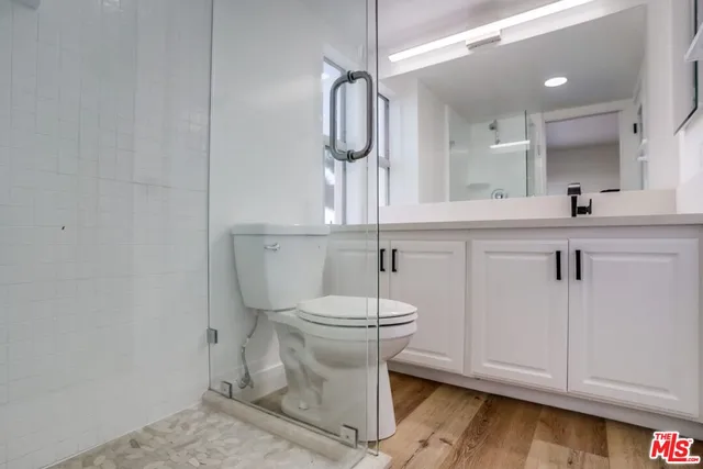 a view of swimming pool from a balcony