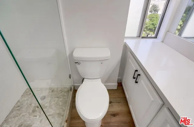 a view of city with tall buildings