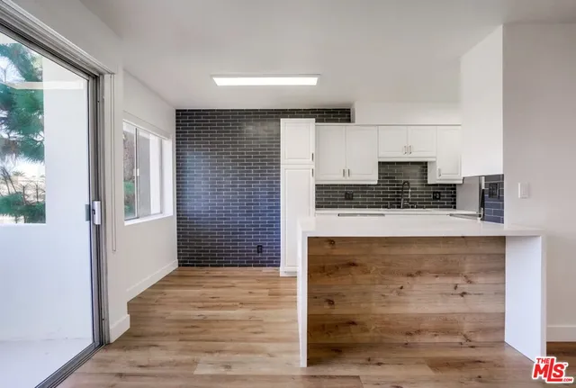 a bathroom with a sink and a bathtub