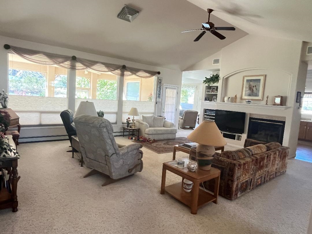 2297 Shiprock Road Grand Junction, CO 81507 - Photo 8 of 12 a living room with furniture and a large window