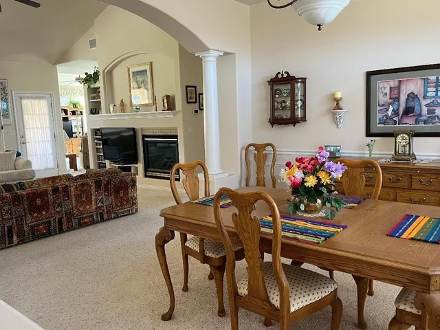 a view of a dining room with furniture