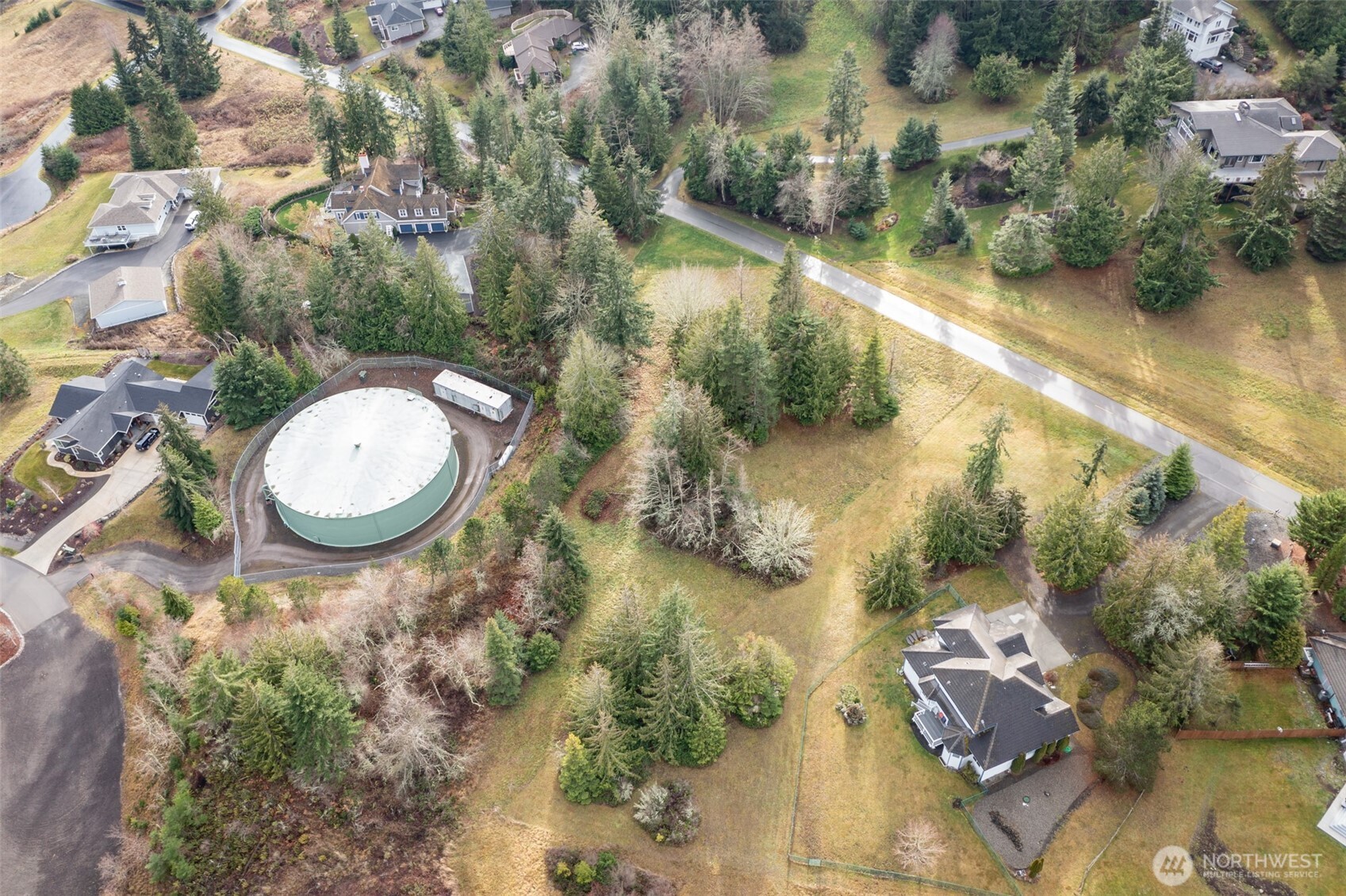 0 Elk Pass Road Sequim, WA 98382 - Photo 7 of 20 an aerial view of a house with a yard and lake view