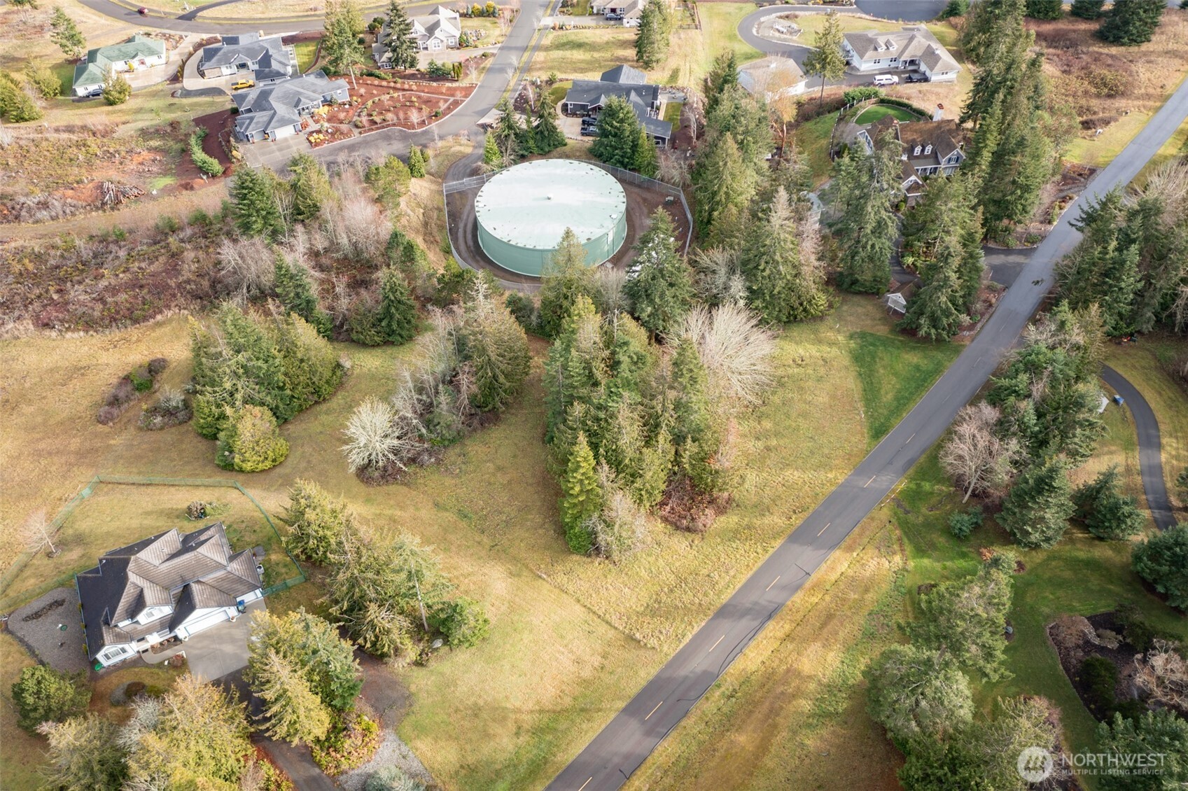 0 Elk Pass Road Sequim, WA 98382 - Photo 9 of 20 a bathroom with a sink and mirror