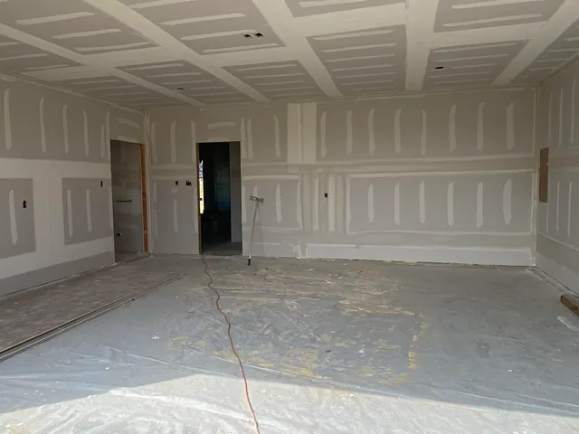 a bathroom with a tub a sink and a shower
