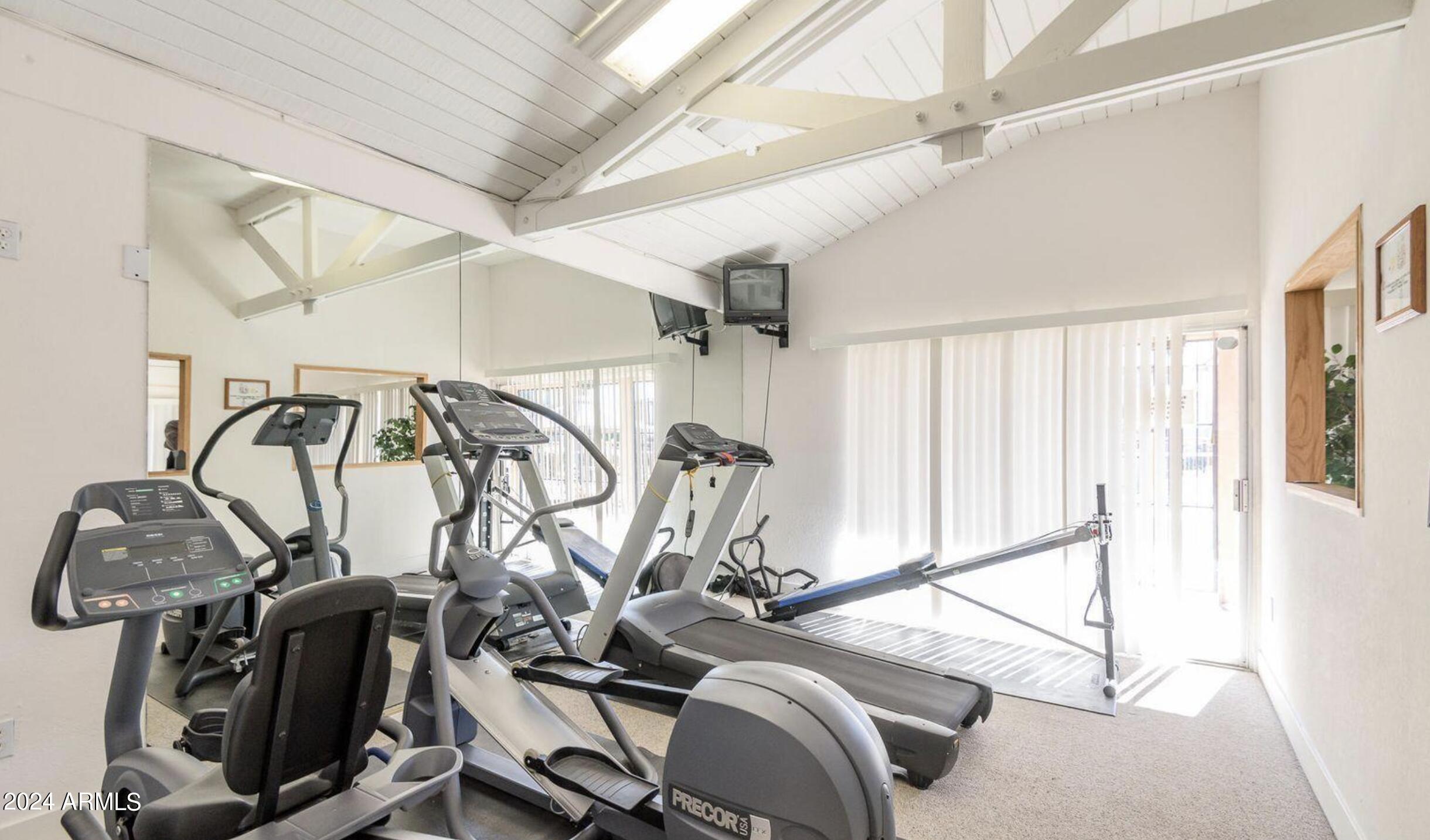 7550 North 12th Street, Unit 121 Phoenix, AZ 85020 - Photo 21 of 21 a view of a room with gym equipment