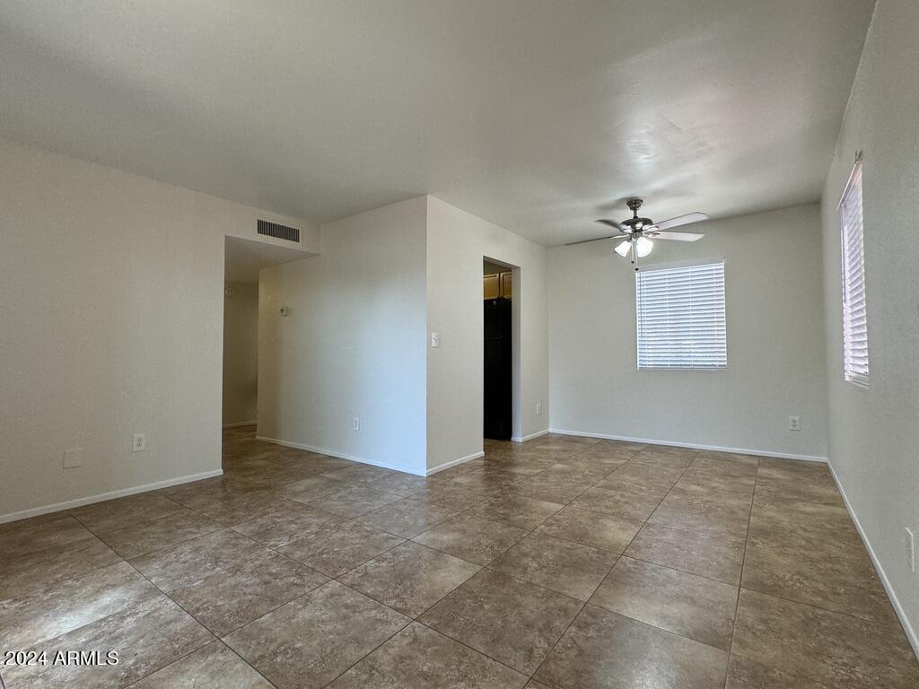 7550 North 12th Street, Unit 121 Phoenix, AZ 85020 - Photo 7 of 21 a view of an empty room with a window